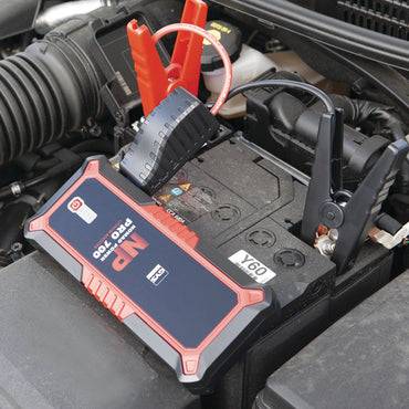 GYS Nomad Power 700 028838 2000A Lithium Jump Pack connected to a car battery for emergency vehicle starting. Ideal for 12V cars, SUVs, and boats.