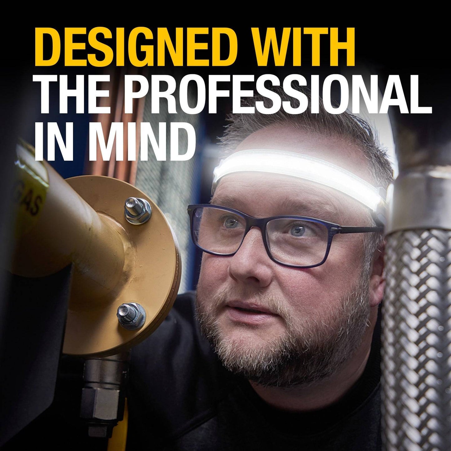 Professional using Flexible Head Torch RIL0115 in industrial setting, showcasing bright, close-range illumination for precision work.