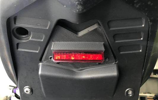 Aprilia RS660 Rain Light Bracket mounted in subframe under tray with red LED light and Ducati-type 2-pin connector for British SportBike use.